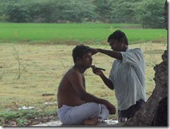Eldest son getting shaved