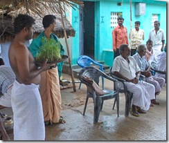 Oldest son leading the walk to the vaillage temple