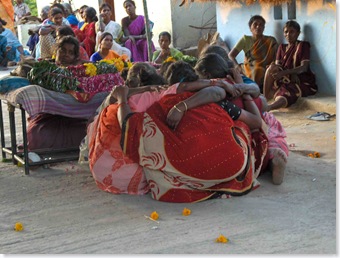 Woman joined together in mourning