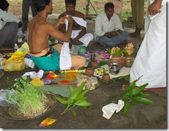 Working on the cloth strip for eldest son