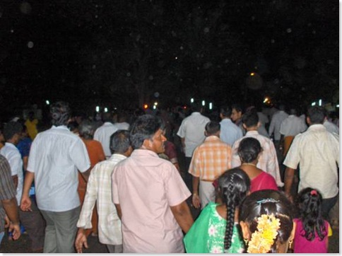 People walking pradakshina